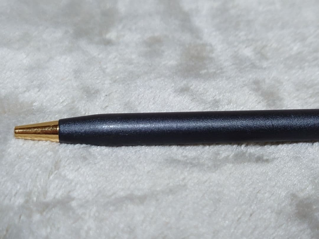 Cross Classic Century ballpoint pen in matte black with gold decoration and conical cap design