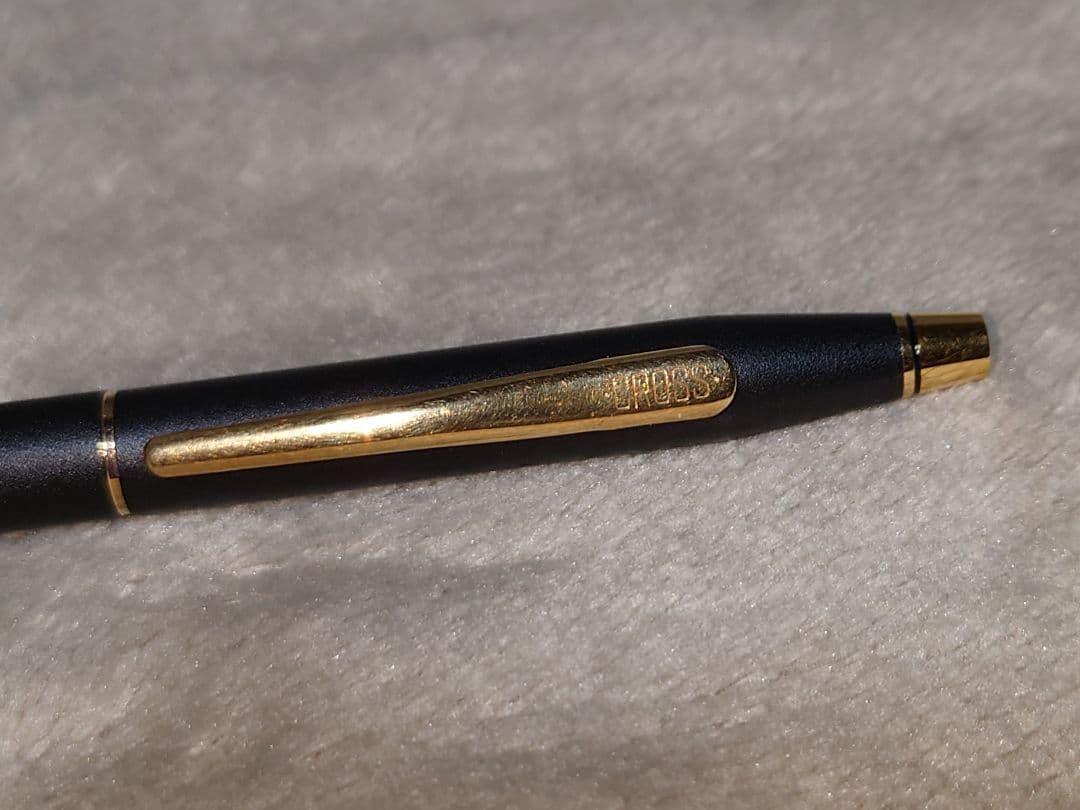 Cross Classic Century ballpoint pen in matte black with gold decoration and conical cap design