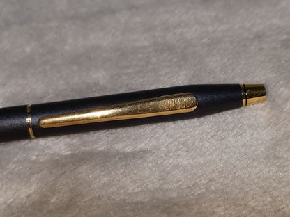Cross Classic Century ballpoint pen in matte black with gold decoration and conical cap design