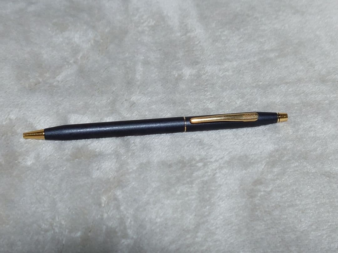 Cross Classic Century ballpoint pen in matte black with gold decoration and conical cap design