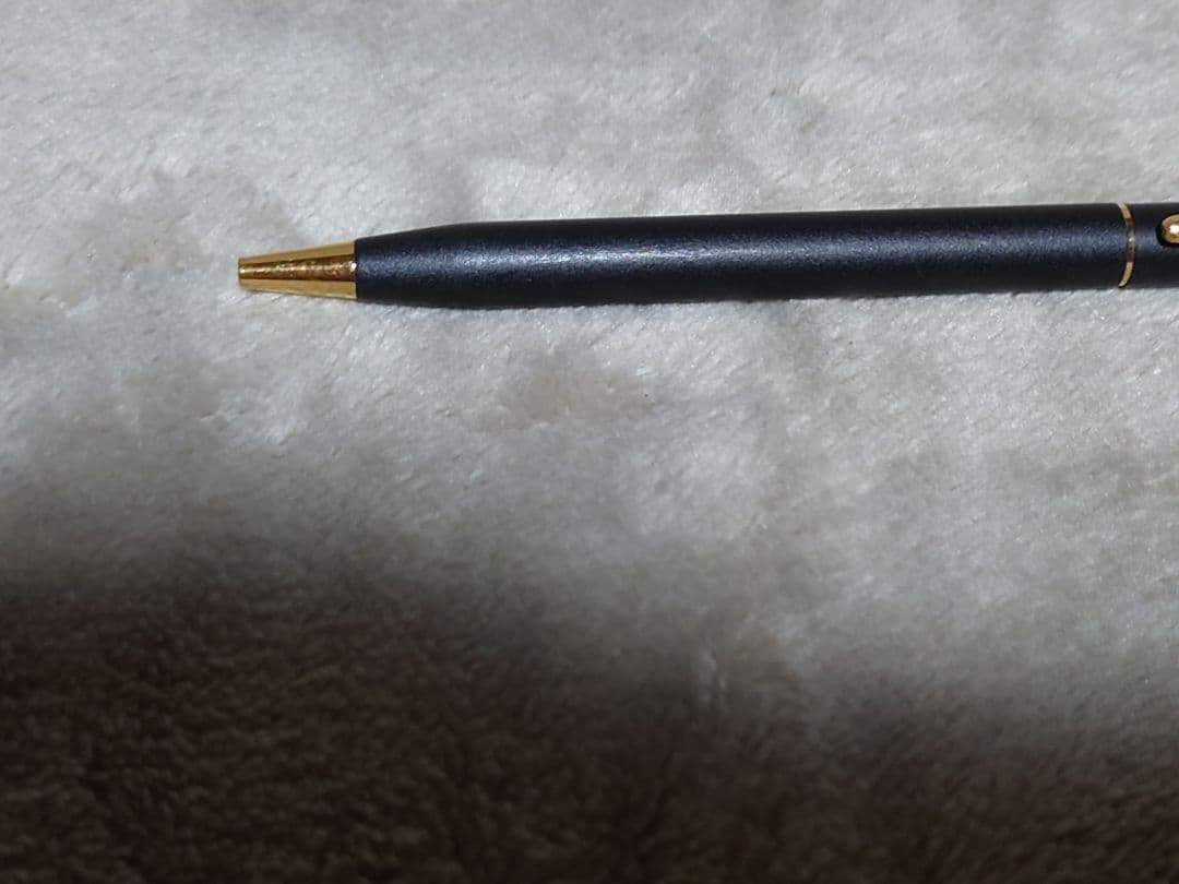 Cross Classic Century ballpoint pen in matte black with gold decoration and conical cap design