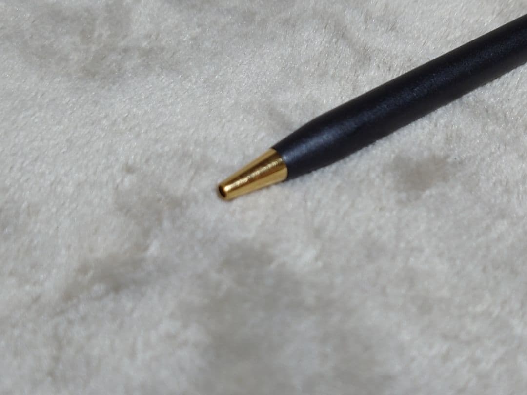 Cross Classic Century ballpoint pen in matte black with gold decoration and conical cap design