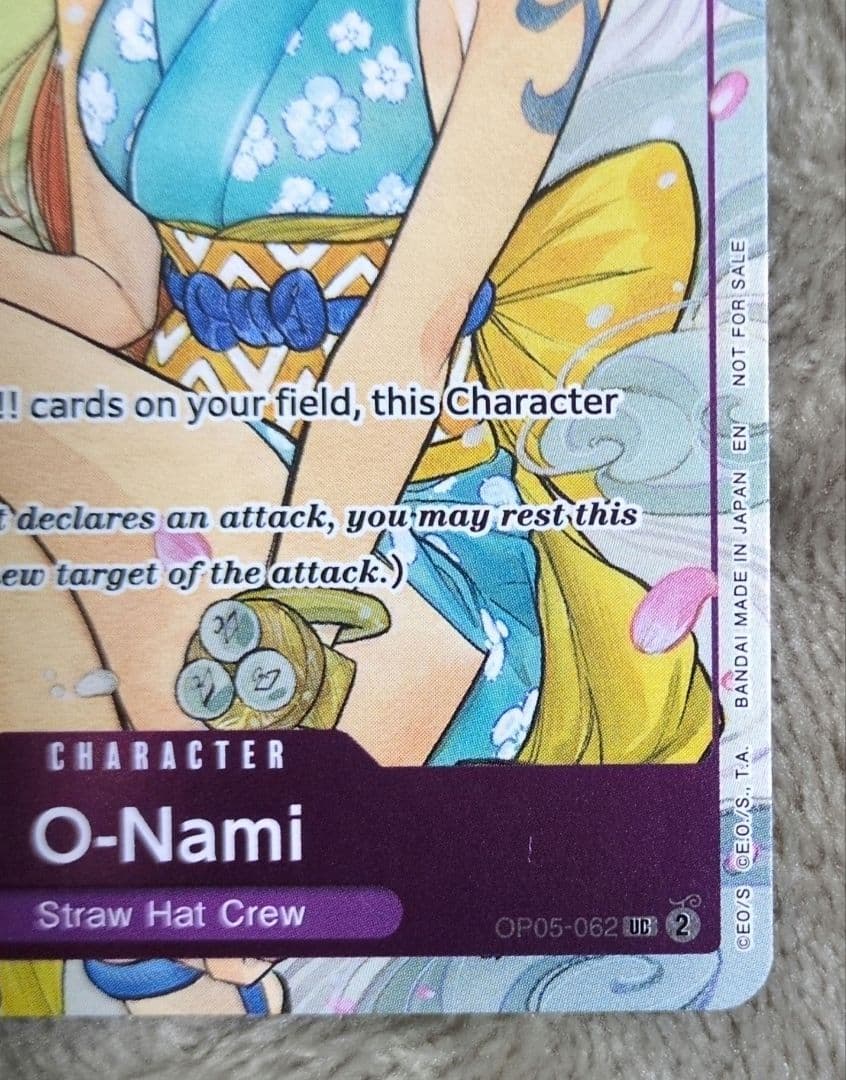 Onami One Piece card game overseas edition Japan import showing card OP05-062 illustrated by Peach Momoko