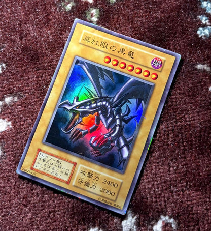 Yu-Gi-Oh Red-Eyes Black Dragon Initial Ultra Rare Japanese trading card featuring iconic dragon artwork