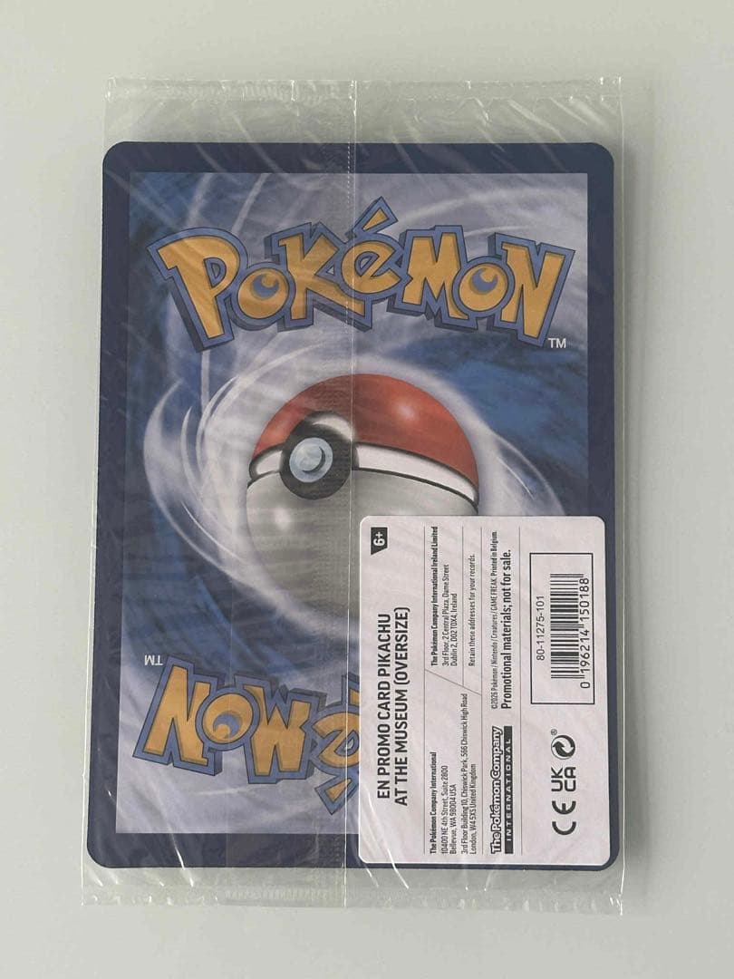 Unopened Pokémon Pikachu trading card from London Natural History Museum with protective cover