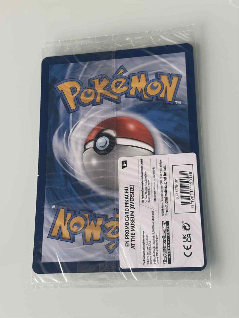 Unopened Pokémon Pikachu trading card from London Natural History Museum with protective cover