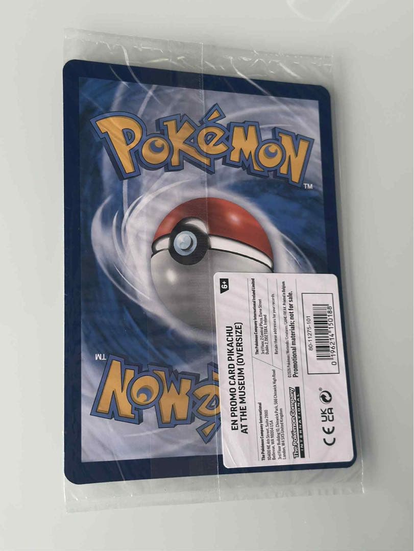 Unopened Pokémon Pikachu trading card from London Natural History Museum with protective cover