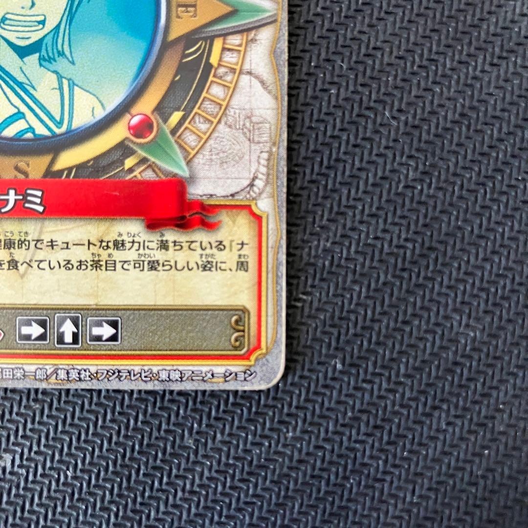 One Piece Nami WRSR Rare Wari Berri trading card with power 2800 and stats displayed