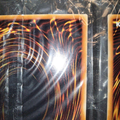 Unopened Bandai Yu-Gi-Oh official tournament winner promo card in deteriorated plastic wrapper