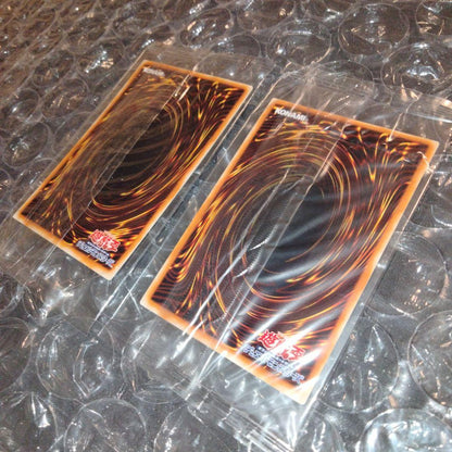 Unopened Bandai Yu-Gi-Oh official tournament winner promo card in deteriorated plastic wrapper