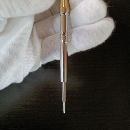 Cross brand gold color twist-operated ballpoint pen with slim sleek design