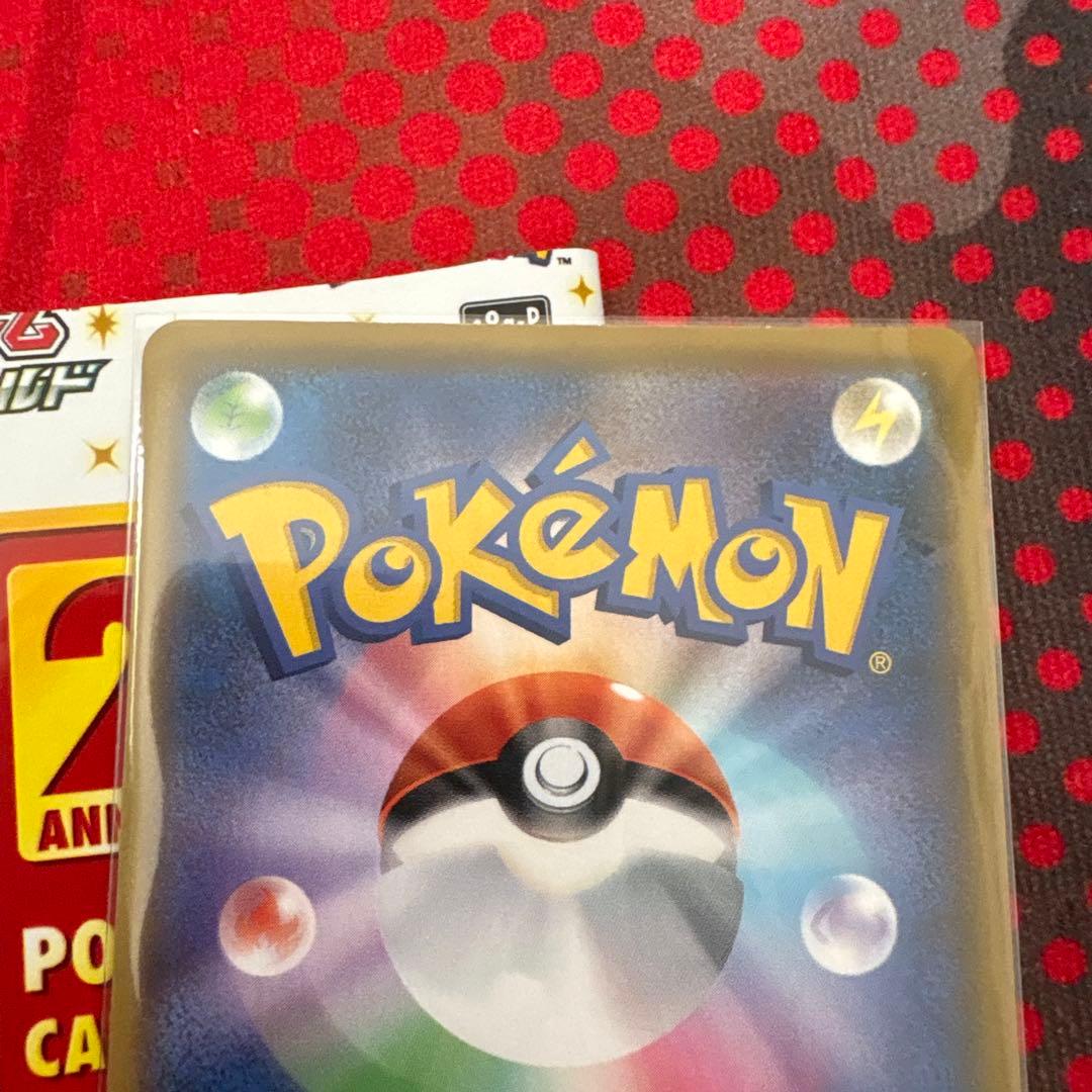 Pokemon Card Reshiram 25th Anniversary collectible trading card with 130 HP and techniques Extreme Flare and Blue Flame