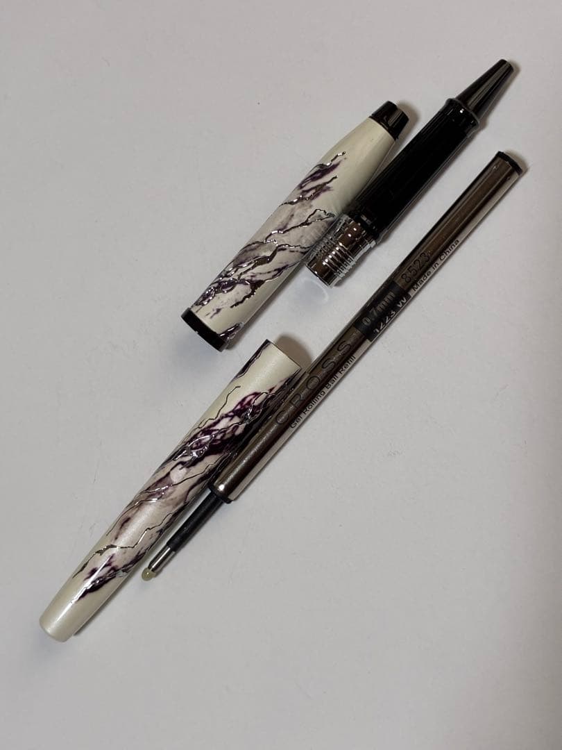 Cross Wonderlust Everest SelectTip rollerball pen model NAT0755-1 with white and ivory pearl base, black ink, and original box