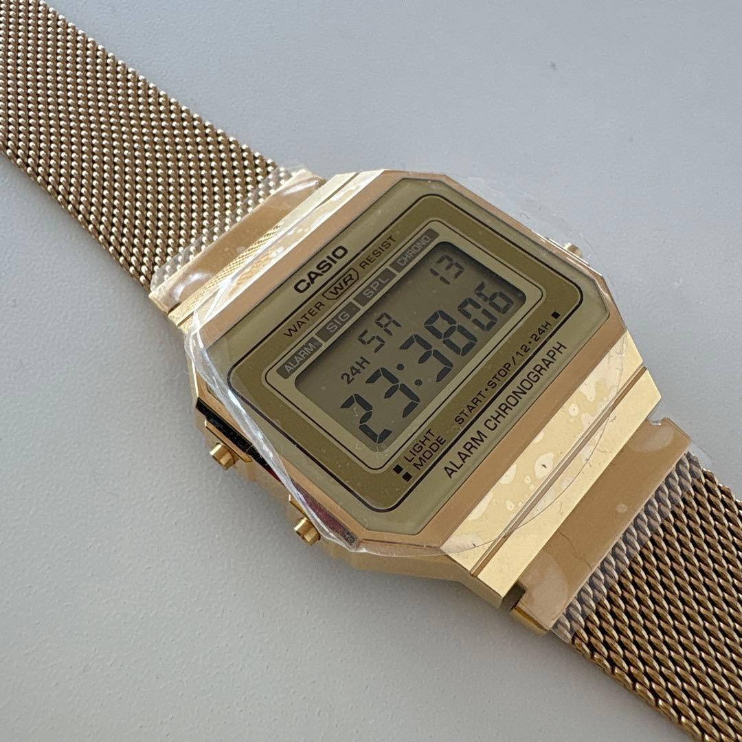 Casio A700WMG-9A Digital Watch with Gold LCD and Stainless Steel Band