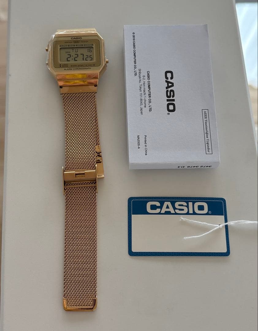 Casio A700WMG-9A Digital Watch with Gold LCD and Stainless Steel Band