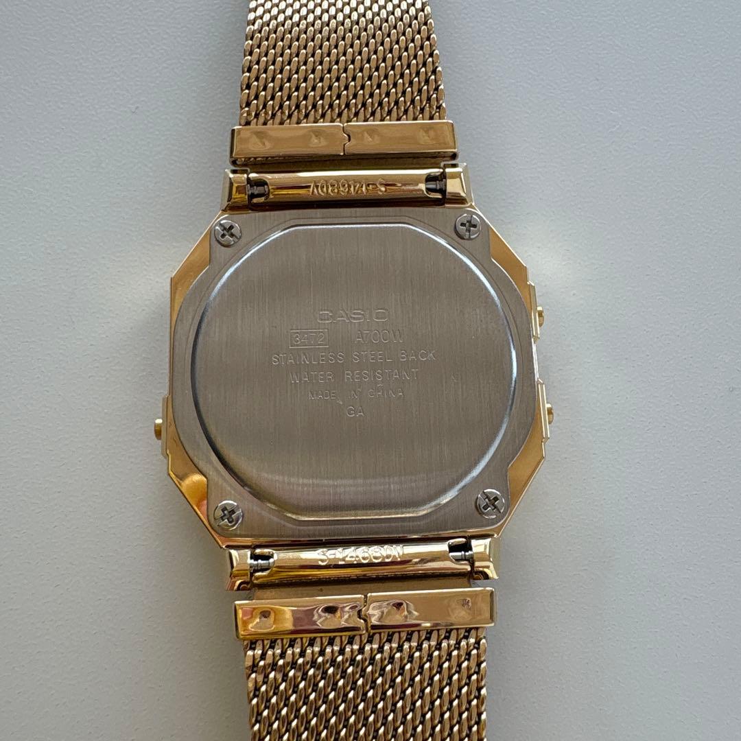 Casio A700WMG-9A Digital Watch with Gold LCD and Stainless Steel Band