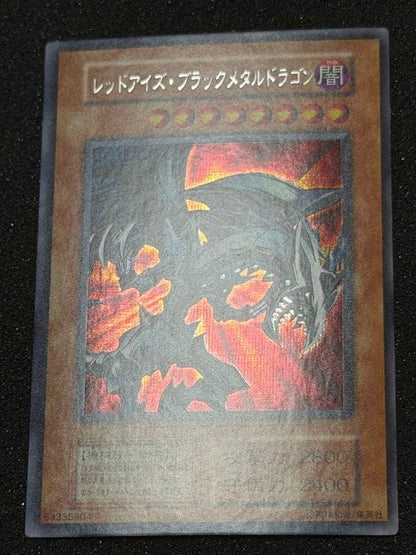 Yugioh Red Eyes Black Metal Dragon Initial Edition monster card from the Red Eyes series