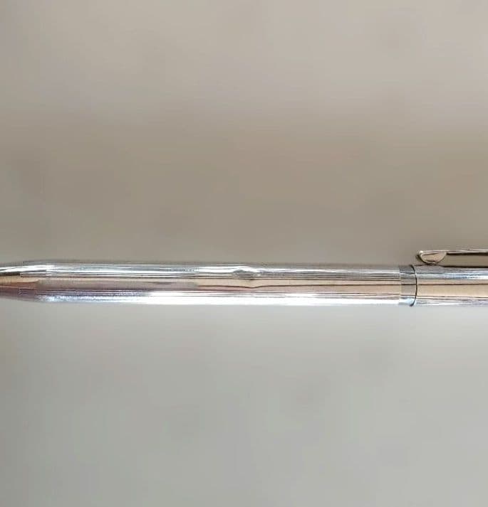 Cross sterling silver ballpoint pen body with two replacement refills shown in original condition with small dent