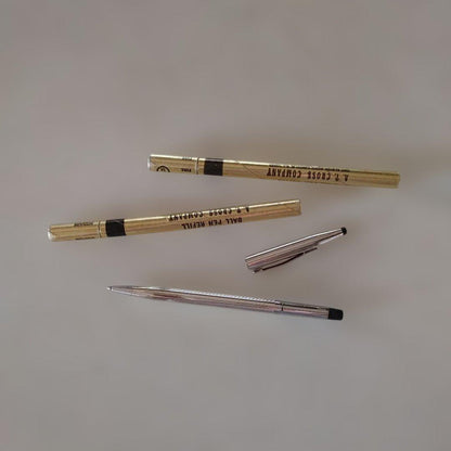 Cross sterling silver ballpoint pen body with two replacement refills shown in original condition with small dent