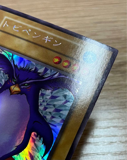 Yugioh Tobi Penguin Ultra Secret Rare Early Edition card Japan Import showing vivid artwork and rarity details