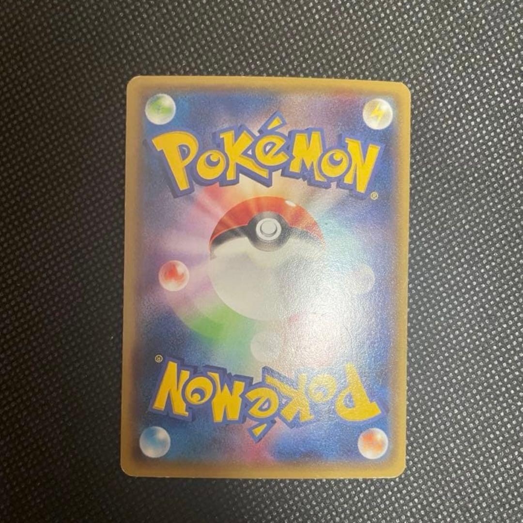 Bandai Pokémon Card Mega Rayquaza EX featuring 230 HP and 300 damage attack with Pokémon logo back design