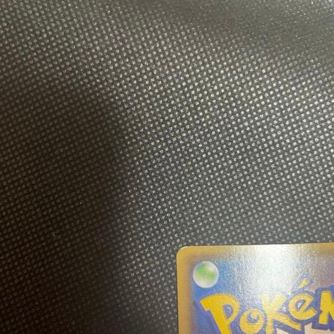 Bandai Pokémon Card Mega Rayquaza EX featuring 230 HP and 300 damage attack with Pokémon logo back design