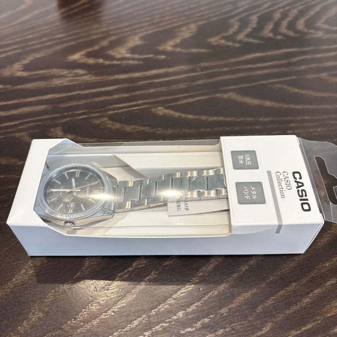 Casio Collection Quartz Watch Model MTP-1302D-1A1JF with Metal Band and Date Feature — Japan Import
