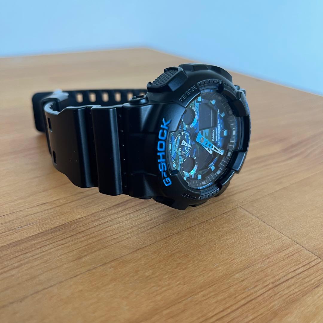 Casio G-Shock GA-100CB-1AJF Watch with Blue Camouflage Dial Japan Import