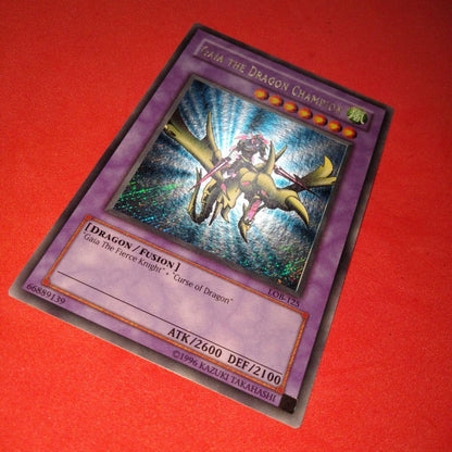 Yu-Gi-Oh Gear Blue-Eyes White Dragon secret rare error card LOB-125 with gold letters and wavy paper