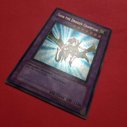 Yu-Gi-Oh Gear Blue-Eyes White Dragon secret rare error card LOB-125 with gold letters and wavy paper
