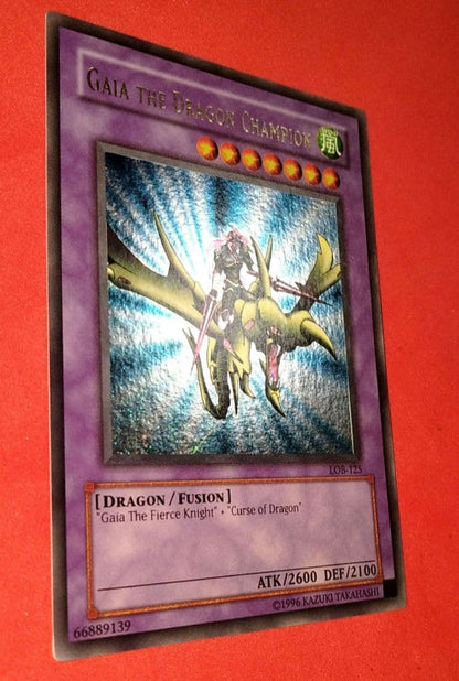 Yu-Gi-Oh Gear Blue-Eyes White Dragon secret rare error card LOB-125 with gold letters and wavy paper