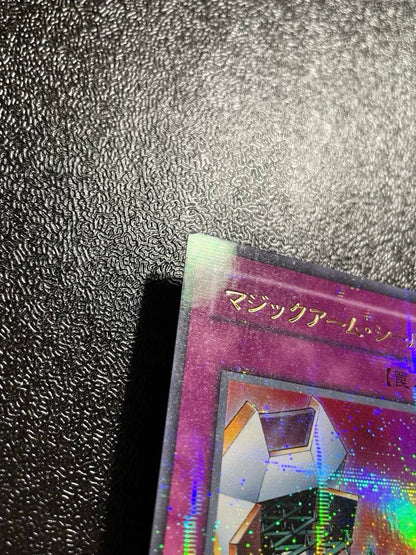 Yugi-Oh Magic Arm Shield Parallel Rare trading card with slight corner peeling and minor back scratches