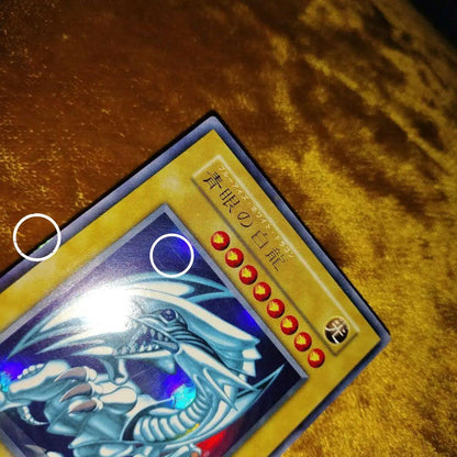 Yugioh Blue-Eyes White Dragon Ultra Rare trading card Japan import with minor surface wear in hard case