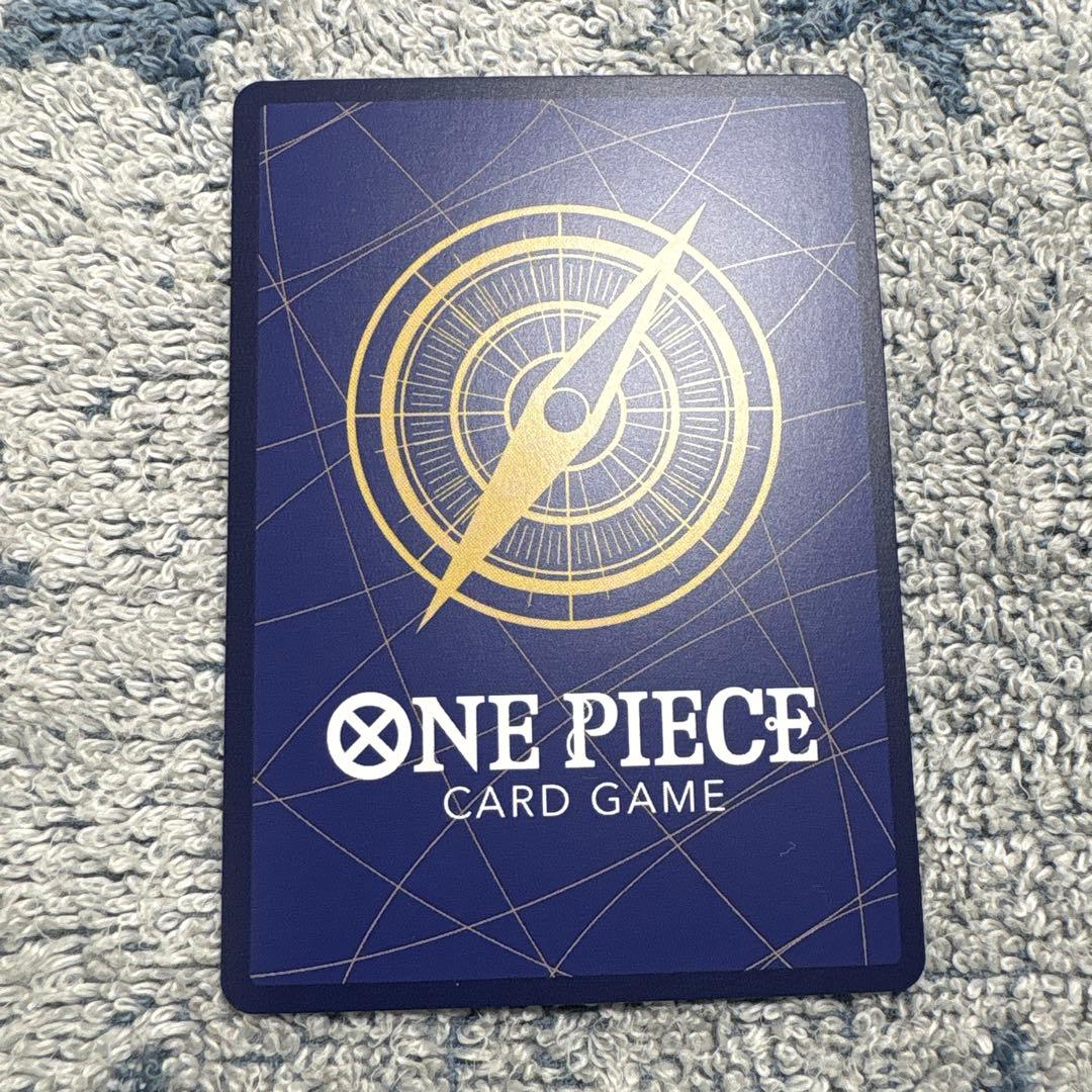 One Piece Tatshigi holographic card ST06-005 showing Navy attribute and Intelligence with Marine features