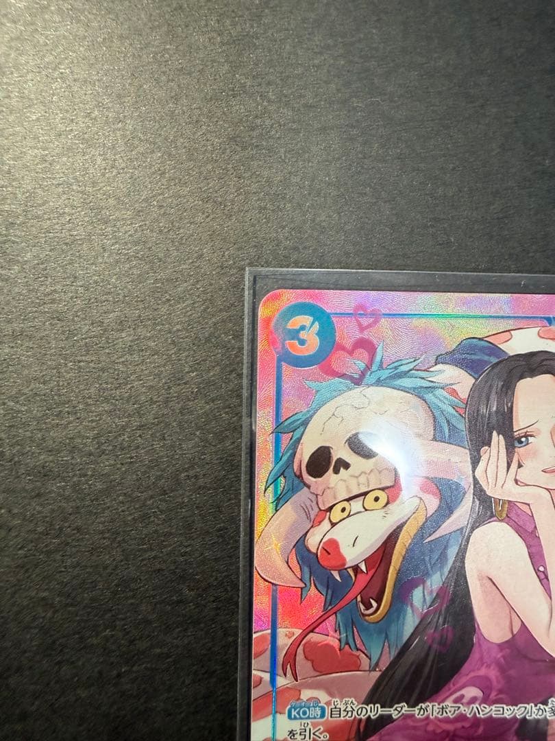 One Piece trading cards featuring Boa Hancock SR and S-Snake R characters from Japan