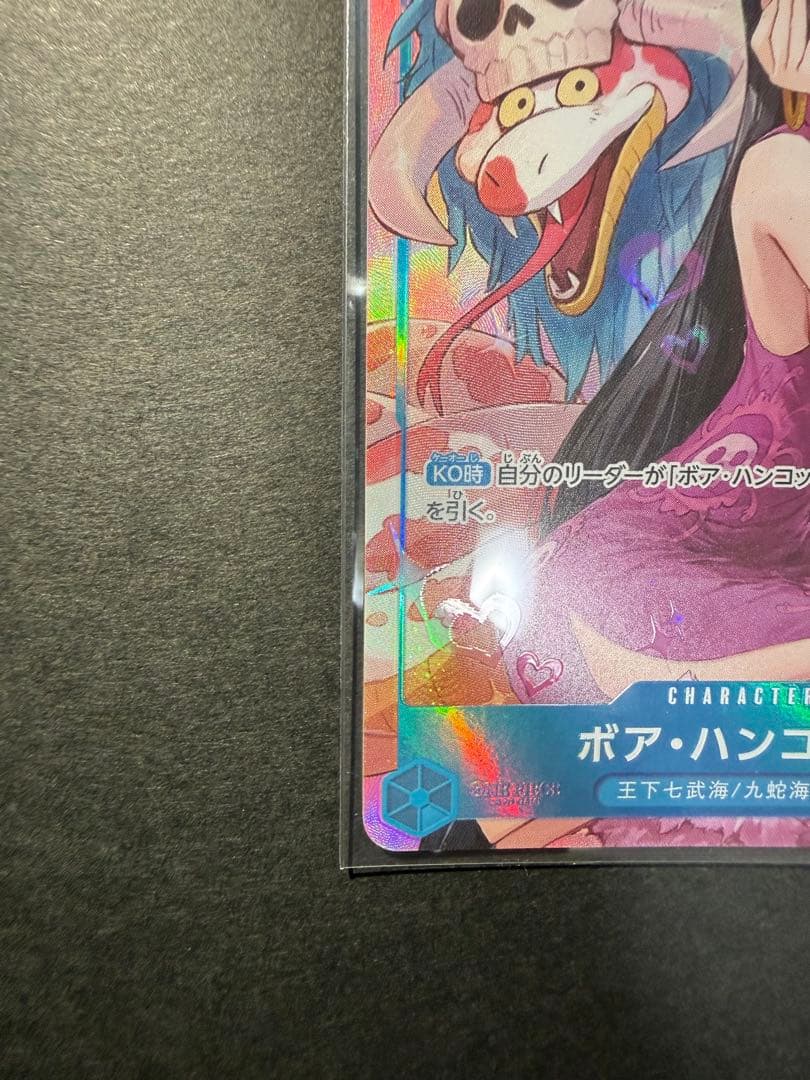 One Piece trading cards featuring Boa Hancock SR and S-Snake R characters from Japan