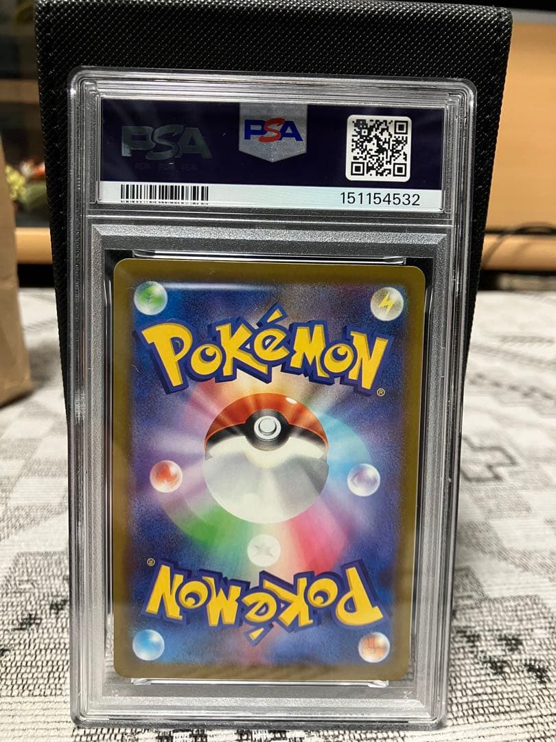 PSA10 graded Mega Charizard X EX 2025 error card with printing and text misprint from Japanese Pokemon series