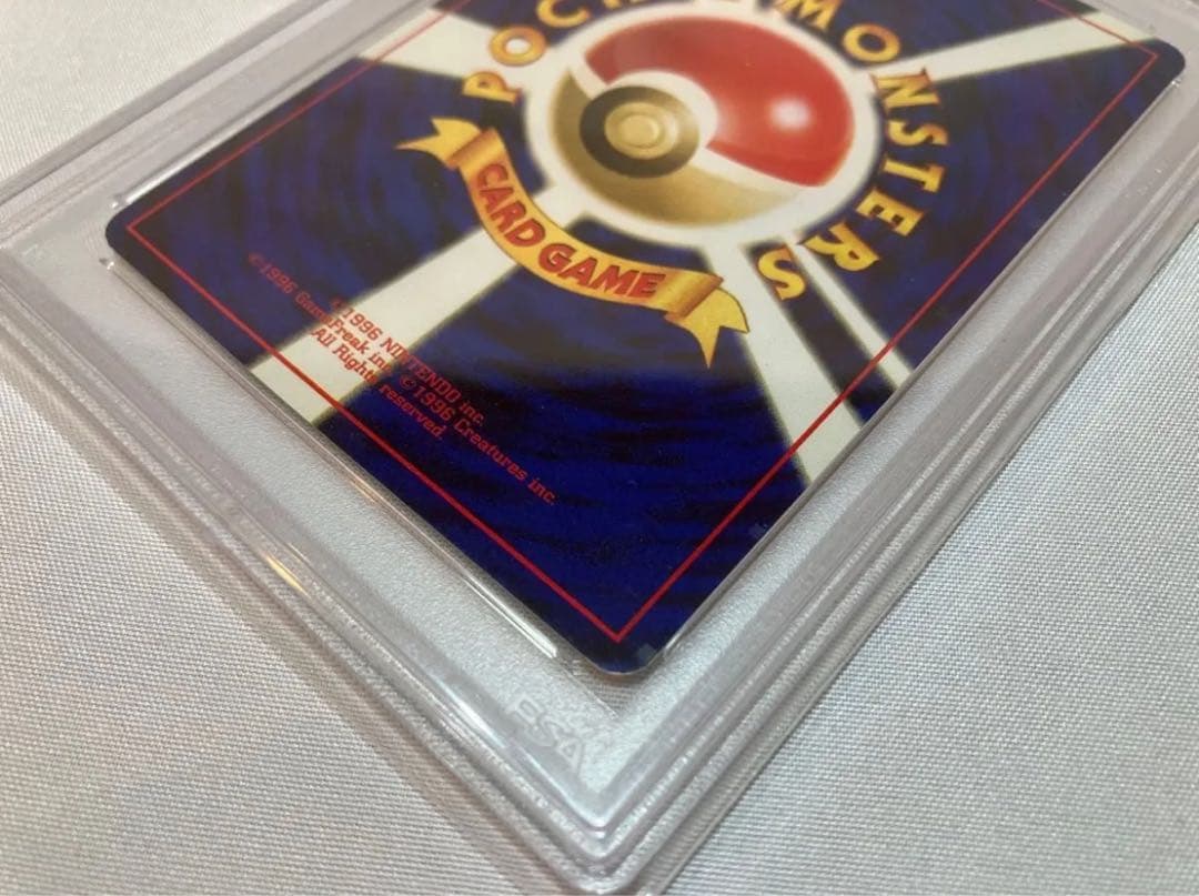 1996 Pokemon Charizard hologram card graded PSA 7 from Japan import, Basic series