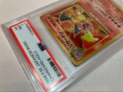 1996 Pokemon Charizard hologram card graded PSA 7 from Japan import, Basic series