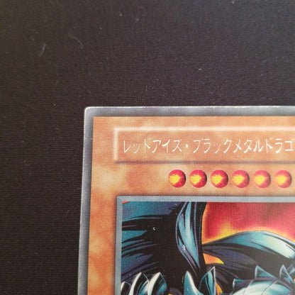 Early secret rare Yugioh Red-Eyes Black Metal Dragon card in near-mint condition for play