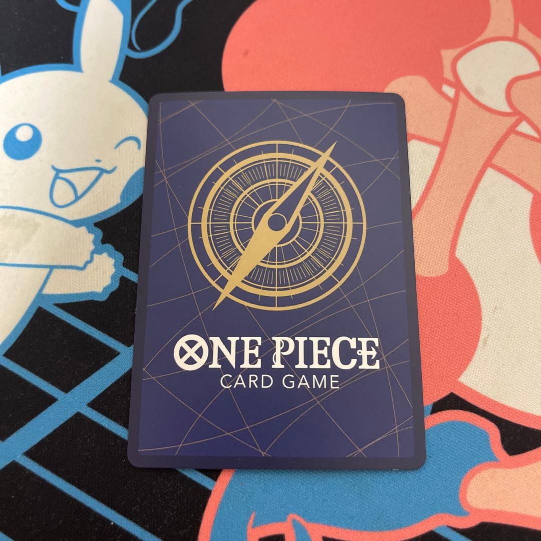 One Piece Official Card Game character card featuring Nami with model number OP06-101