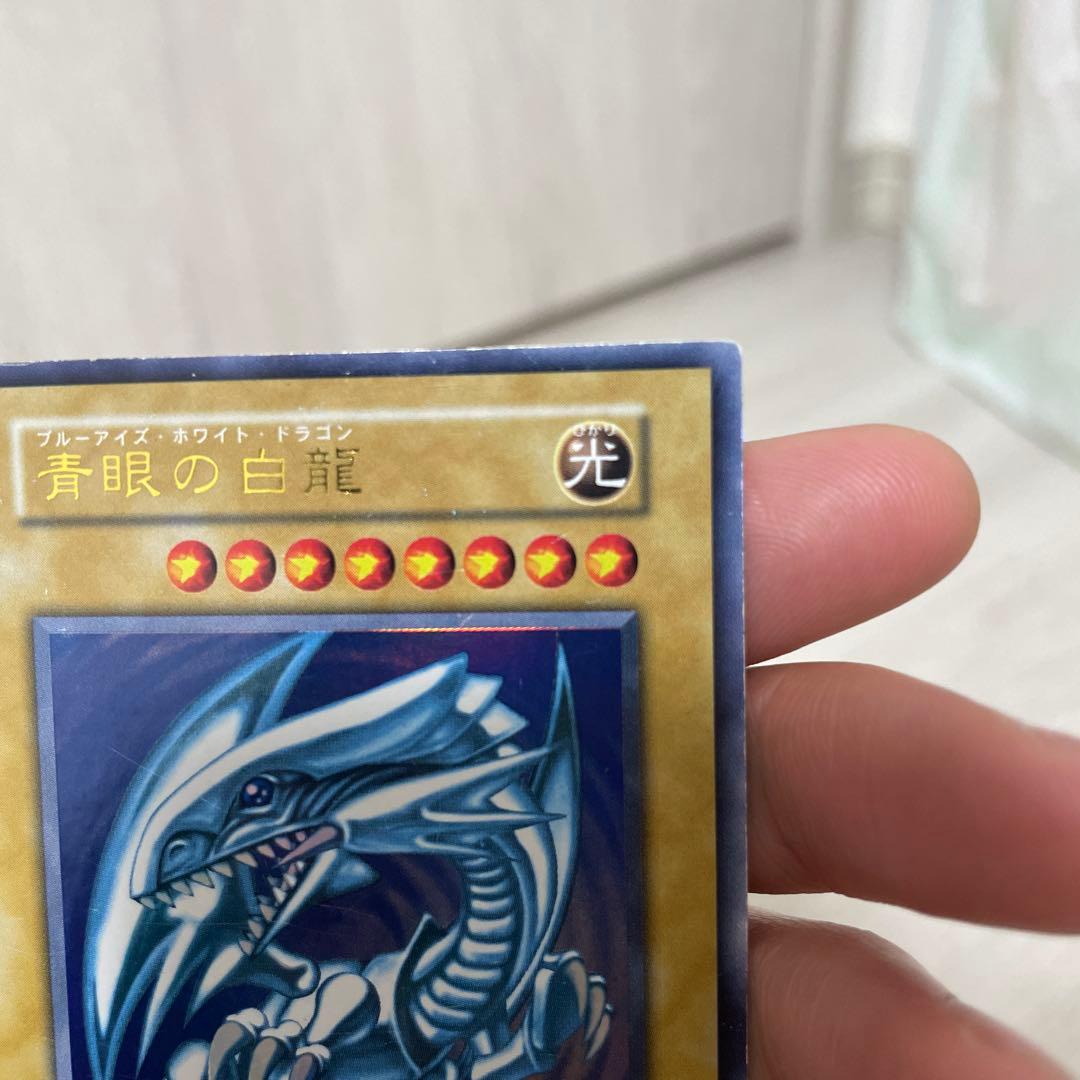 Yugioh Blue-Eyes White Dragon Initial Ultra Rare Japanese card with visible scratches