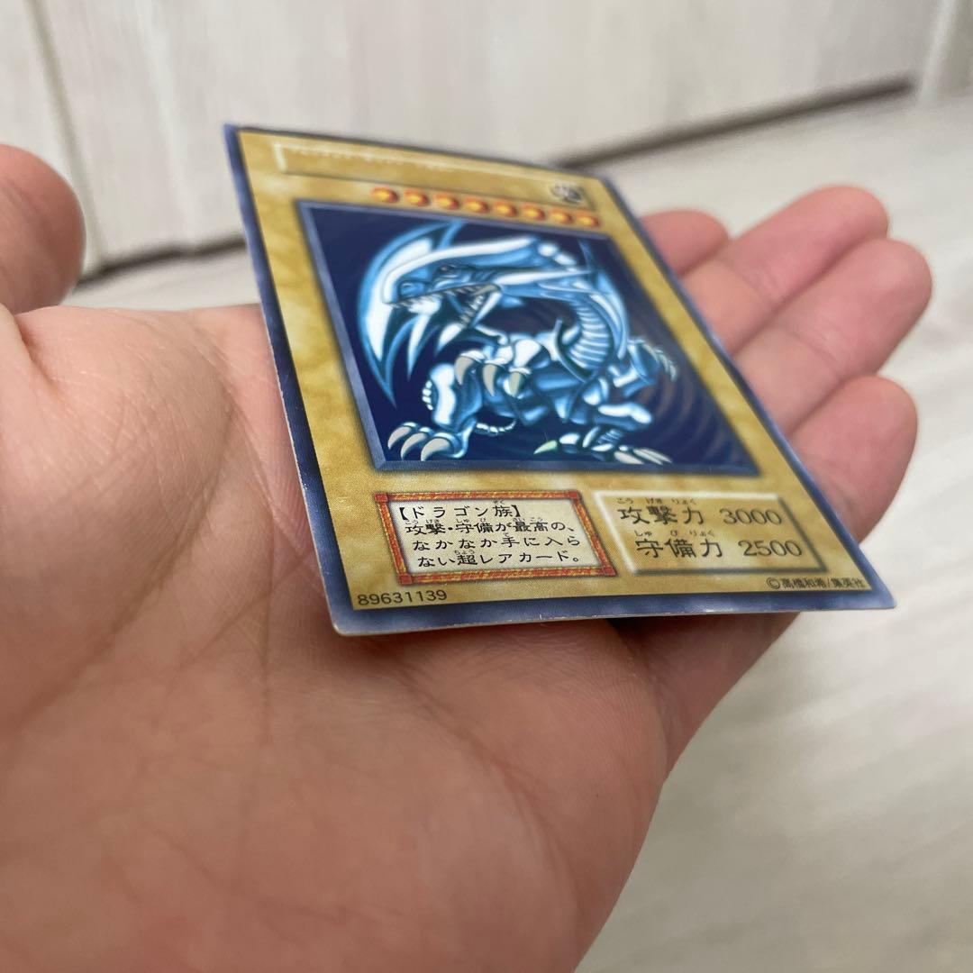 Yugioh Blue-Eyes White Dragon Initial Ultra Rare Japanese card with visible scratches