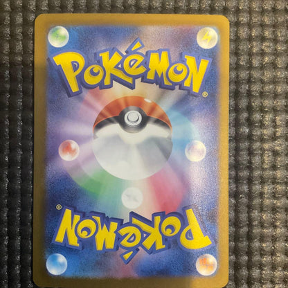 Pokémon Rocket Organization Mewtwo ex SAR Mega Pack card in hard sleeve placed inside a waterproof hard case