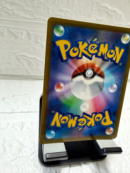 Charizard V SR Pokémon trading card from Star Birth S9 103/100 series in protective sleeve