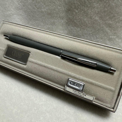 Cross gray metal ballpoint pen with silver clip displayed in its case, made in USA