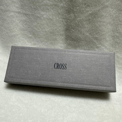 Cross gray metal ballpoint pen with silver clip displayed in its case, made in USA
