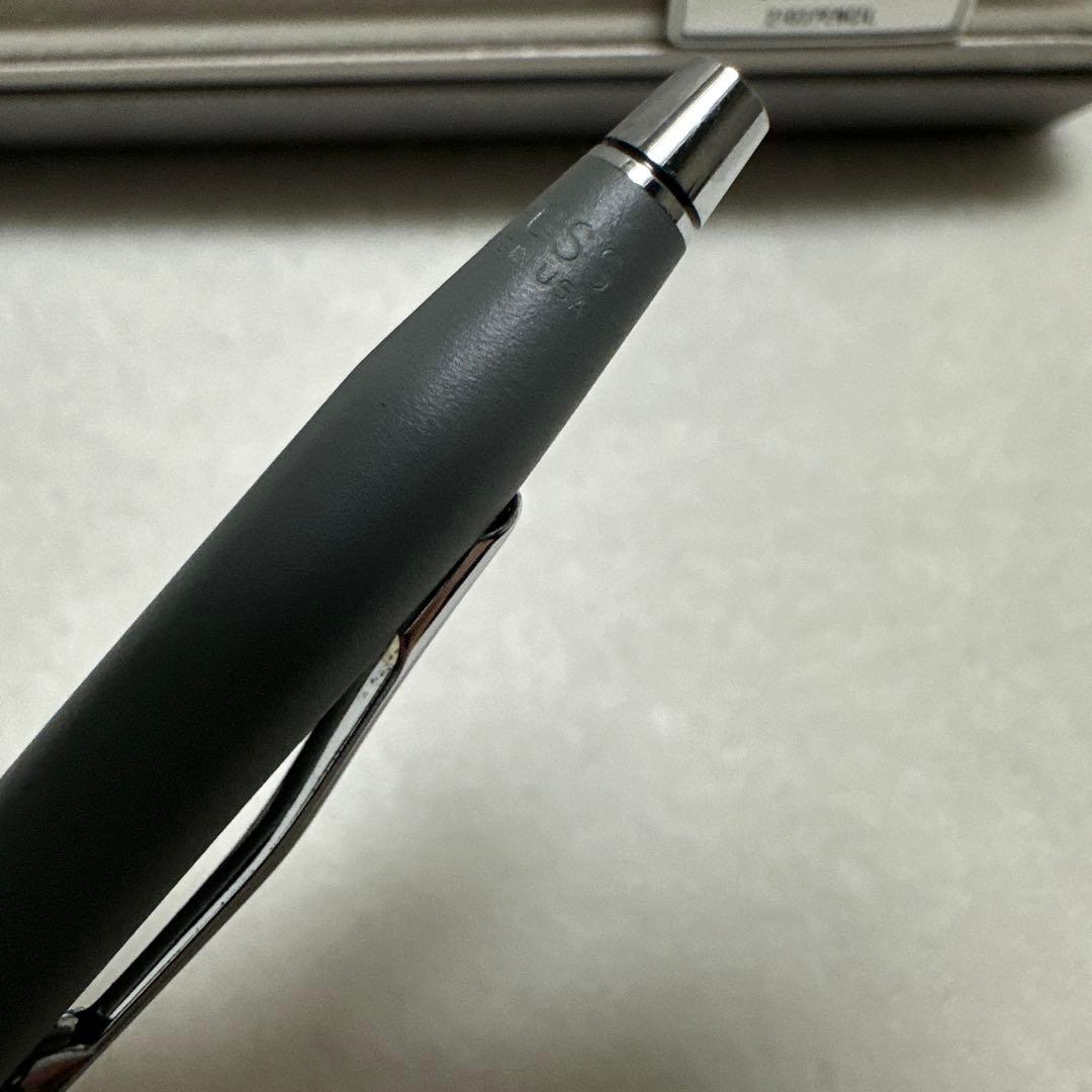 Cross gray metal ballpoint pen with silver clip displayed in its case, made in USA