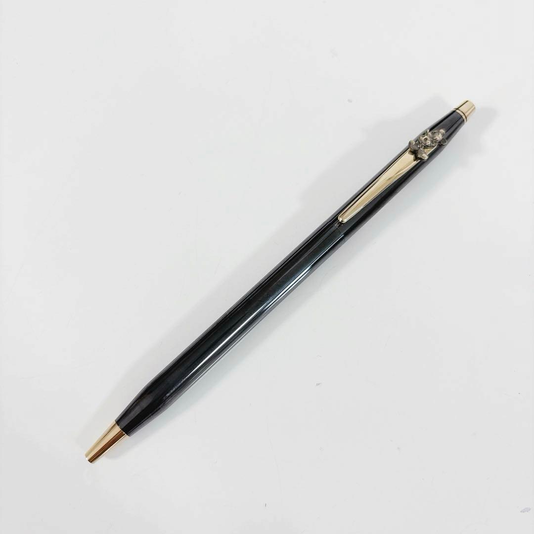 Cross Mickey ballpoint pen with black and gold design featuring Mickey Mouse figure, slight tarnish visible