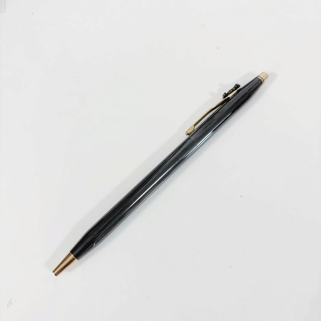 Cross Mickey ballpoint pen with black and gold design featuring Mickey Mouse figure, slight tarnish visible
